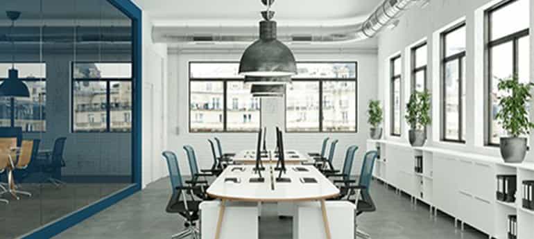 empty open concept office space with white walls